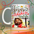 Caneca natalina com ilustração de Jesus segurando um coração e a frase "Jesus é o verdadeiro sentido".