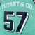 Detalhe da camisa de basquete Tiffany & Co. X NBA X Mitchell & Ness em Tiffany Blue/Black. Logotipo Tiffany na frente, ajuste largo para movimentos livres.