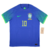 Camisa Reserva da Seleção Brasileira Nike 2022-2023 em azul com detalhes em verde, estampa de onça-pintada nas mangas, Swoosh verde, escudo da CBF, selo “Garra Brasileira” e bandeira nacional estilizada.