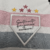 Camisa titular do São Paulo FC New Balance 2024/25 branca, preta e vermelha com listras horizontais em vermelho e preto, escudo centralizado, gola polo tricolor e detalhes únicos. Logo NB preto no peito e frase "Clube da Fé" na nuca.