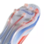 Chuteira de futebol adidas F50 Elite FG Laceless Advancement branca com detalhes em azul e laranja. Possui cabedal ultrafino em Fibertouch para maior proximidade com a bola, colar Primeknit sem cadarço para ajuste seguro, padrão Sprintweb 3D para controle