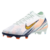 Chuteira Nike Mercurial Vapor 16 Elite FG Dream Speed MDS 009, em cores branca, azul, dourada e laranja. Modelo de futebol projetado para velocidade e precisão, com tecnologia Air Zoom embutida na sola, cabedal em FlyKnit ultrafino, GripKnit para maior ad