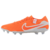 Chuteira de futebol Nike Tiempo Legend X Elite FG em cores vermelho e branco. Apresenta design moderno com cabedal FlyTouch+ macio e travas circulares para máxima tração e agilidade em campo.