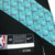 Regata City Edition do Portland Trail Blazers Nike 2022/23 - Design único inspirado no carpete do Aeroporto de Portland. Padrão azul-petróleo, faixa 'Blazers' no peito e detalhes que homenageiam o campeonato de 1977.