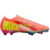 Chuteira Nike Mercurial Vapor 16 Elite FG Cosmic Speed Chapter 2 em cores laranja e amarela, com design futurista e tecnologia Air Zoom para máxima velocidade e desempenho.