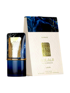 Frasco de perfume Lattafa Al Nashama Caprice con su estuche, mostrando diseño elegante en tonos dorado y azul.