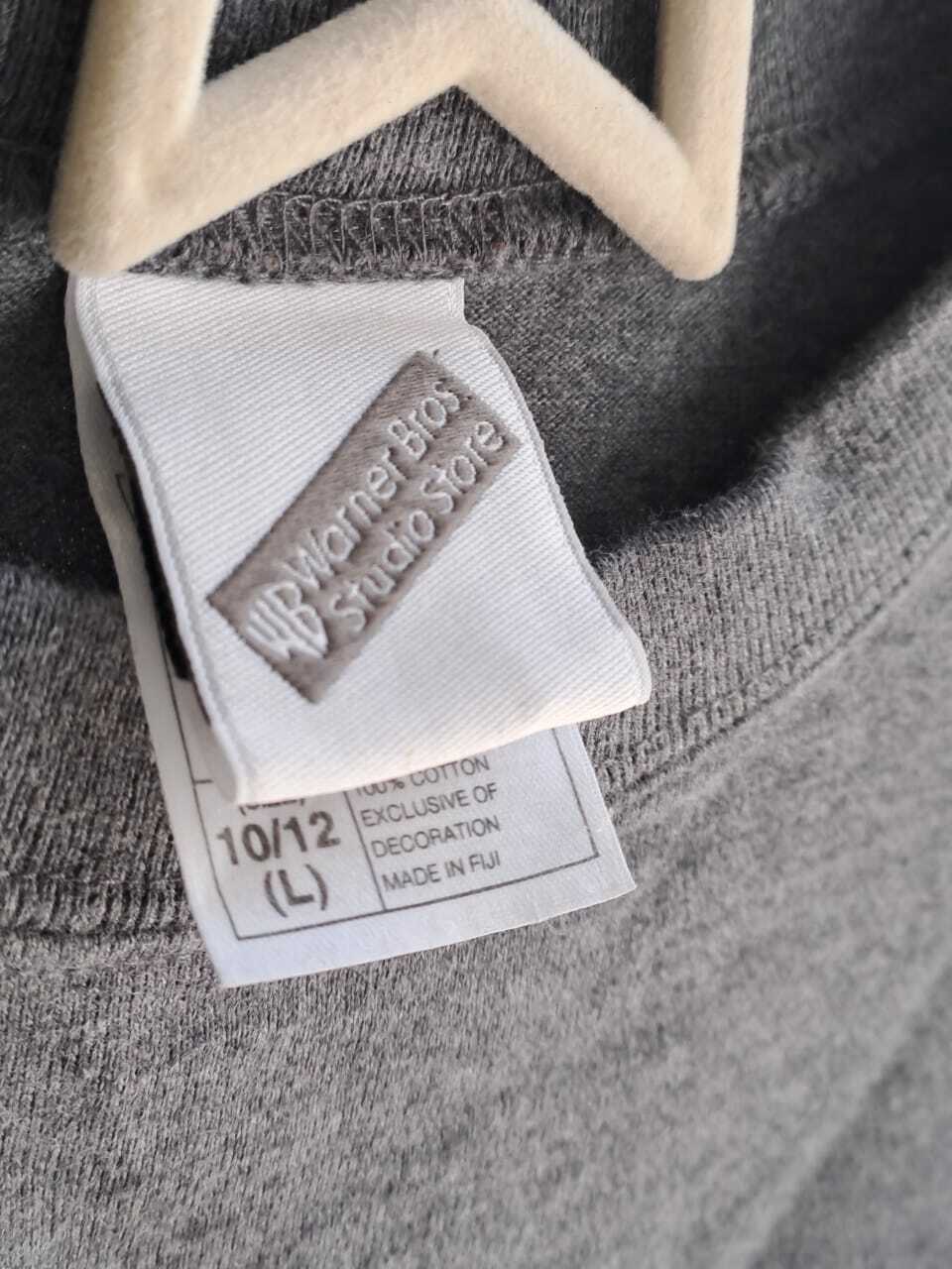 Buzo gris y negro finito WARNER BROS Talle 10 12