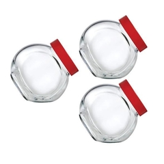 três potes de vidro com tampa vermelha para guardar temperos e condimentos