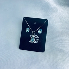 Conjunto com zircônia em gota azul claro