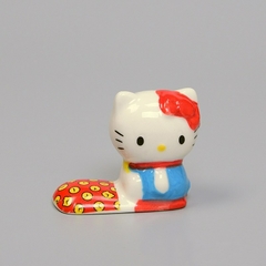 Adorno Doraimon -Hello Kitty ( apoya cubierto) en internet