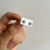 Topo circón plata mini con rosca de seguridad en internet