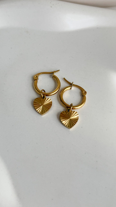 Argollas Sunset Corazon | Acero Dorado - comprar online