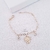 Pulseira infantil de menina com pontos de luz folheada em ouro 18K