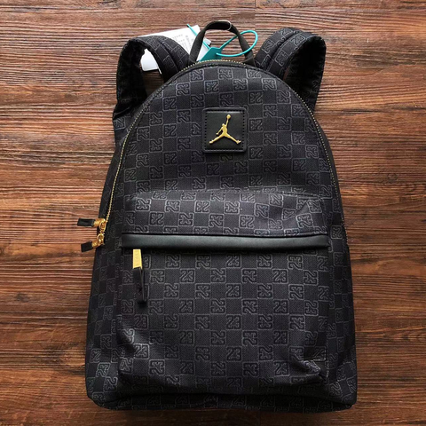 Jordan backpack black and gold deals