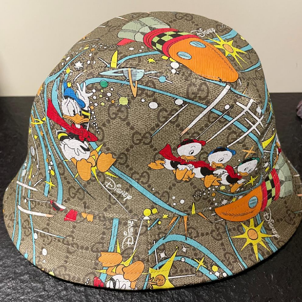 Exclusiveness and Style: Gucci X Disney Donald Duck Supreme Hat"