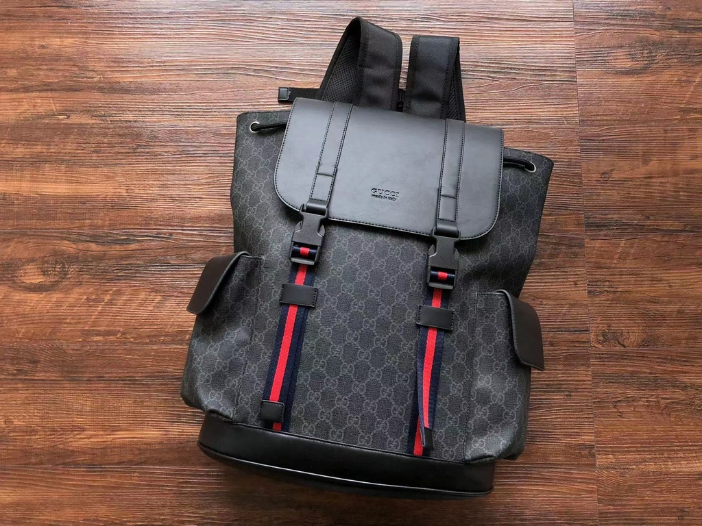 GG Black sling backpack in GG Supreme