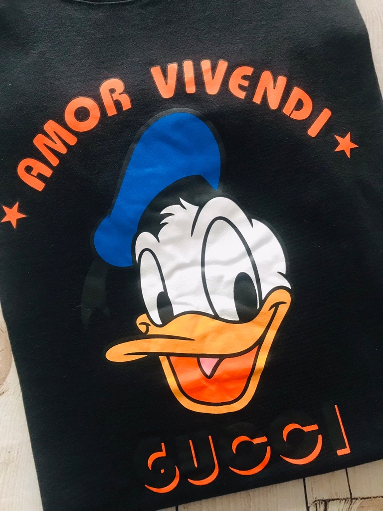 Camiseta Gucci anlimada com rosto Pato Donald