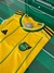 Camisa Jamaica Home 23/24 - Versão Torcedor - Masculina - Amarela
camisa da seleção da Jamaica, camisa oficial da Jamaica, uniforme da seleção jamaicana, comprar camisa do Jamaica, camisa de futebol da Jamaica, camisa Jamaica 2024, loja de camisas do Jama