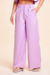 Calça Pantalona Alfaiataria Barbie Lilas na internet