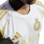 comprar-a-camisa-do-al-nassr-3-iii-24-2024-2025-25-third-reserva-adidas-branco-com-dourado-detalhes-creme-bege-cr7-cristiano-ronaldo-7-camisa-de-time-loja-tealto-sports-