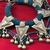 Par de brazaletes Kuchi flexible con chaquiron azul y piezas Tanit - buy online