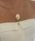 Colar relicário oval com dois corações banho de ouro 18k - RS STORE | Semijoias Exclusivas e Minimalistas