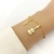 Pulseira Pingente Notas Musicais em Banho de Ouro 18K - comprar online