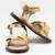 Mini Sandália Babi Dourada na internet