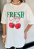 T-shirt Over Fresh Cherries na internet