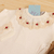 Body Bebê Suediene Gola Colombina Rococó Nara - Marfim e Vermelho na internet