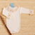 Body Bebê Suediene Gola Colombina Rococó Nara - Marfim e Rosê - comprar online
