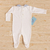 Macacão Bebê Algodão Egípcio Bordado Enrico - Marfim com Azul na internet