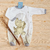 Kit Enxoval de Bebê Dino Ivan Cinza na internet