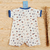 Macaquinho Bebê Algodão Egípcio Carrinhos Mauro - Marfim com Azul - Novo Bebê | Loja Roupa de Bebê Online, Enxoval de Bebê, Presentes