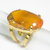 Anel Olho de Tigre Oval Pedra Natural Dourado Aro Ajustável - loja online