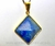 Pingente Piramide Pedra Quartzo Azul Castoação Envolto Flash Dourado - comprar online