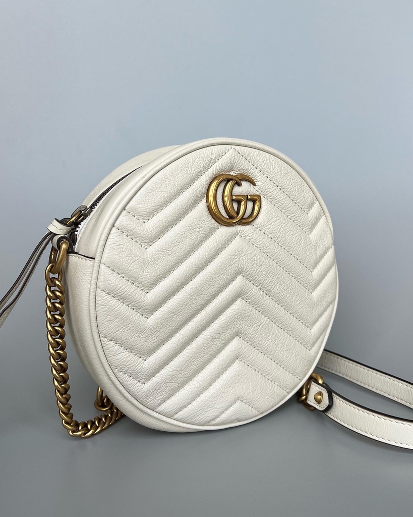 Bolsa Gucci Mini PochetTe Monograma