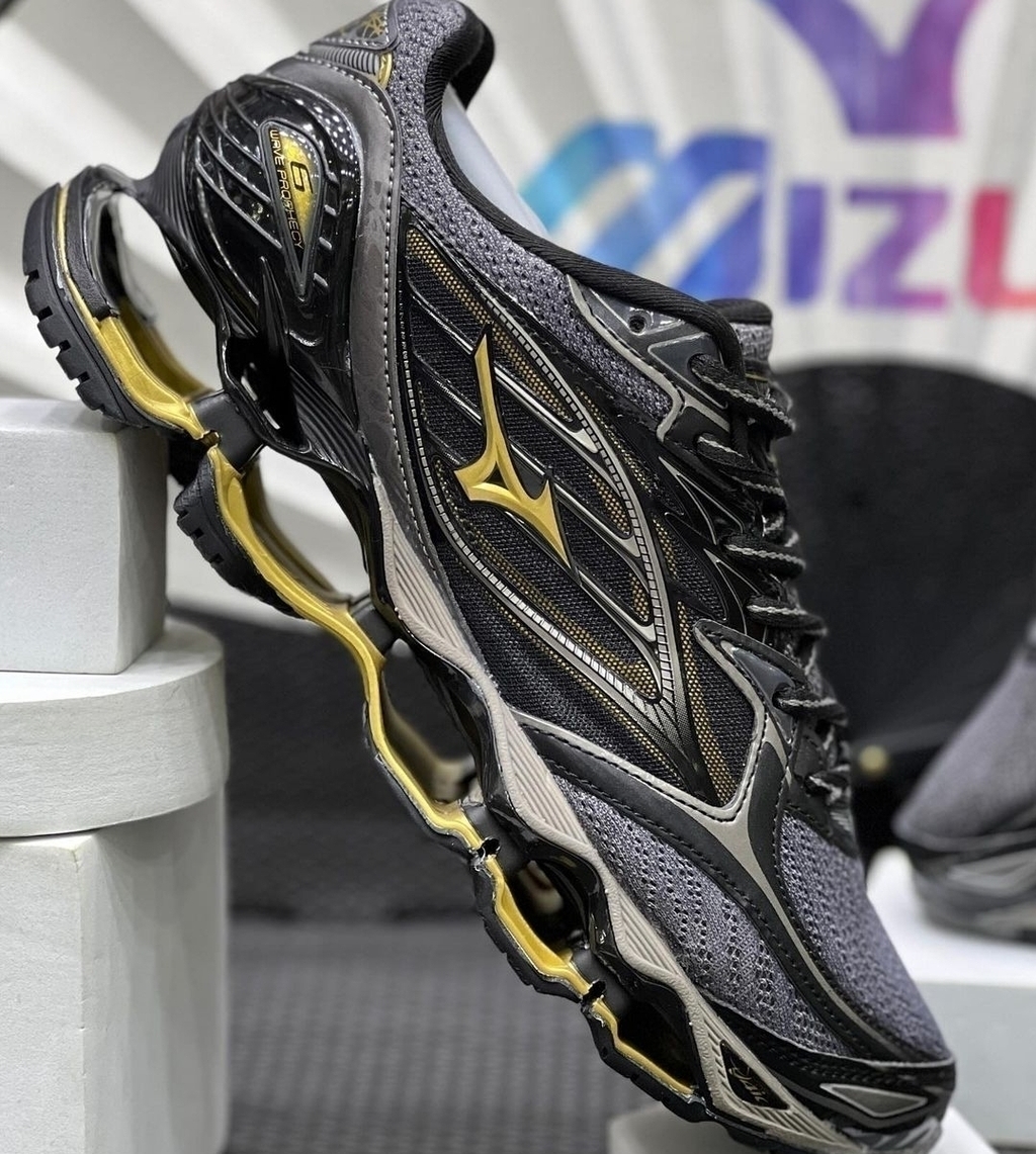 Mizuno x10 dourado new arrivals