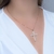 Colar Semijoia Crucifixo Zircônias Quadradas Cristais Dourado - comprar online