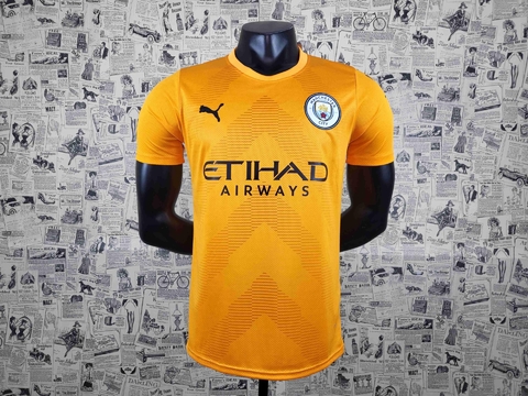 camisa manchester city 2022 2023 goleiro laranja