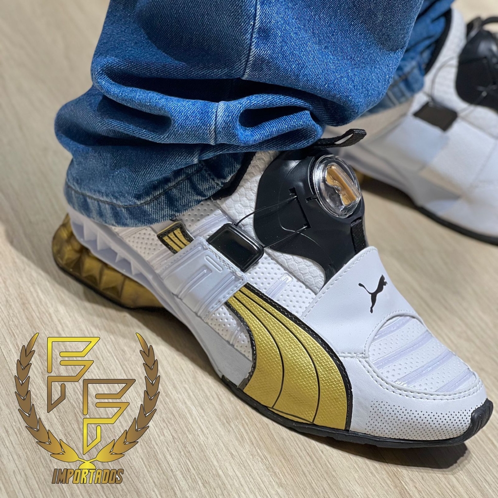 Tênis puma Disc- Branco e dourado