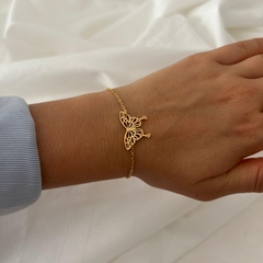 Pulsera de acero dorado mariposa