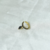 Ear cuff cravejado com zircônias negras e ponto de luz preto folheado a ouro 18K - comprar online