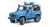 Carro de Polícia LAND ROVER Defender (Prata e Azul) com 1 Policial - Vamos Brincar - Brinquedos Bruder