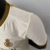 Camisa Al-Nassr Third 22/23 Torcedor Masculina - Dourado e Branco - loja online