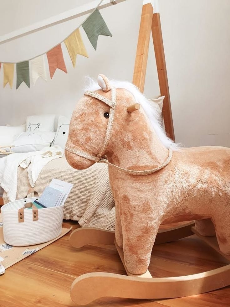 Caballito mecedor de peluche sales