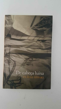 IZHAKI, Flávio. De cabeça baixa