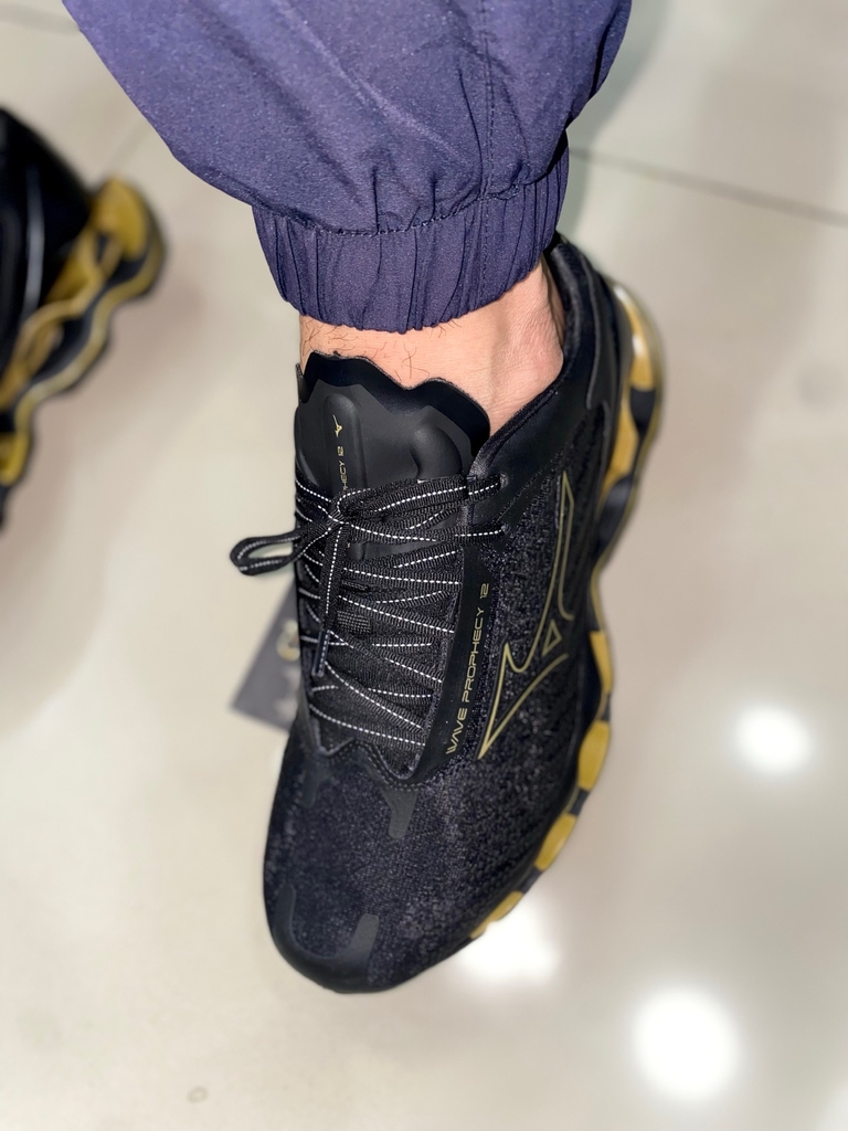 Mizuno prophecy 7 preto e dourado sales