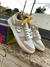 NIKE DUNK LOW GOLD SWOOSH na internet