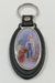 Llavero simil cuero oval con imagen de Ntra Sra de Lourdes